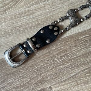 Western style black leather belt with silver cowboy boots 🤠